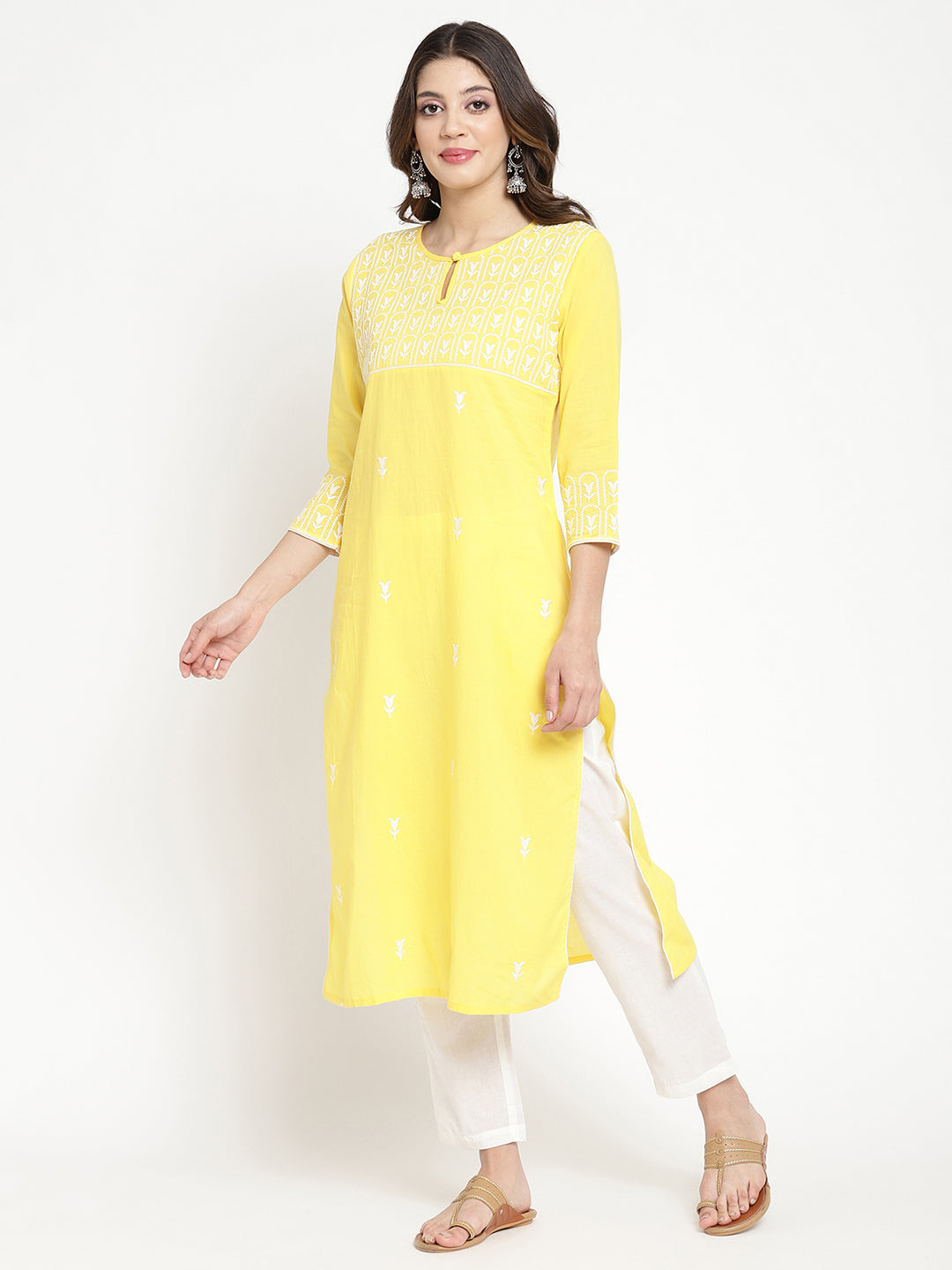 Woman wearing Savi's yellow cotton Kurta.