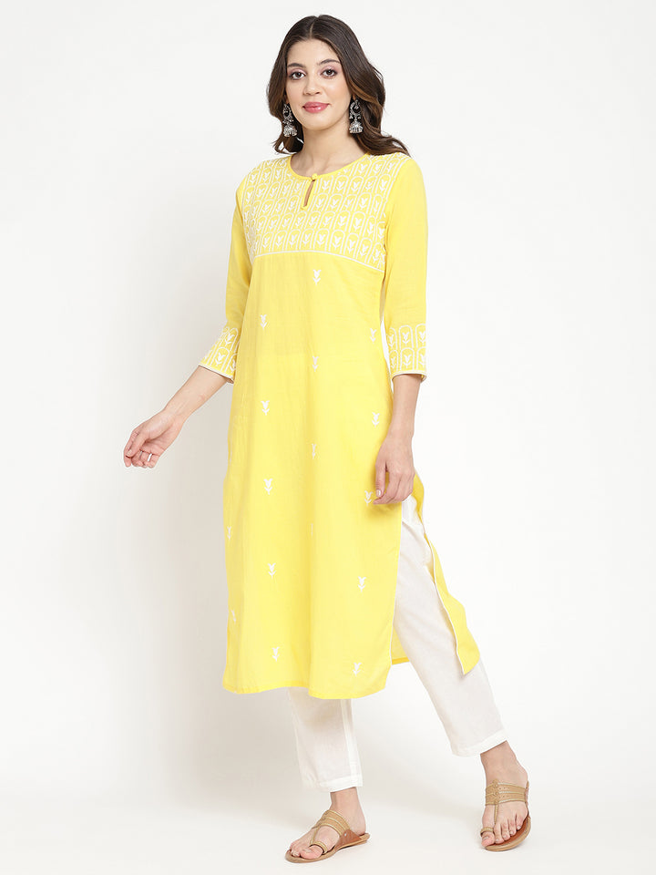 Woman wearing Savi's yellow cotton Kurta.