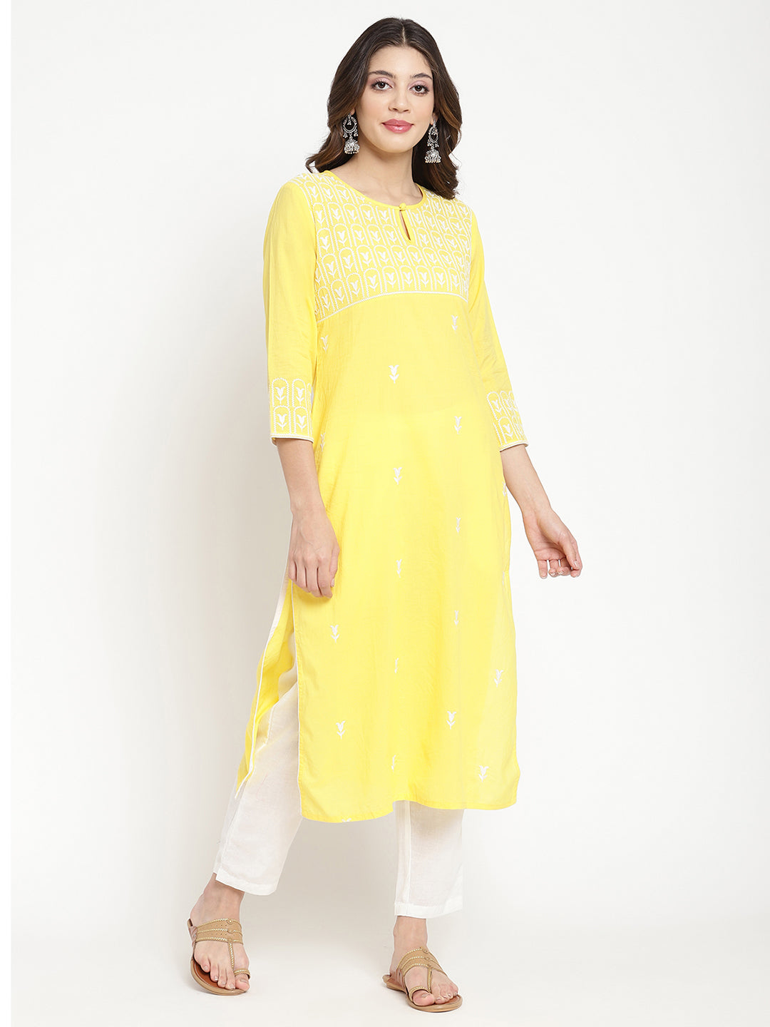 Woman wearing Savi's yellow cotton Kurta.