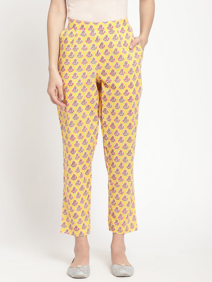 Woman wearing yellow pants made of cotton fabric.