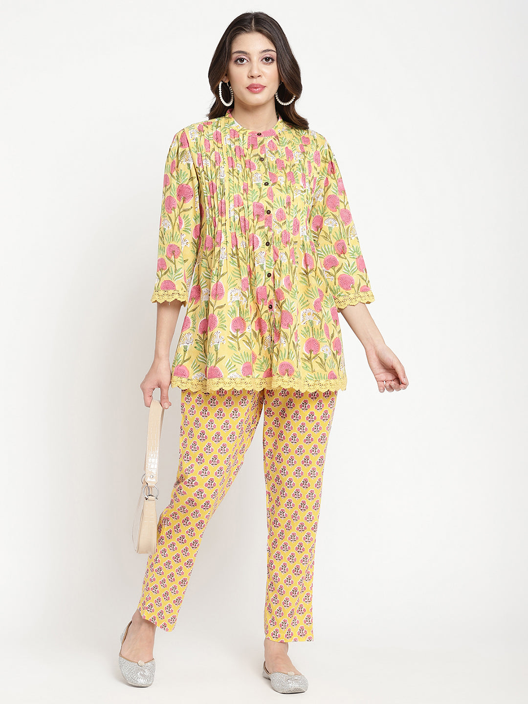 Woman wearing yellow pants made of cotton fabric.