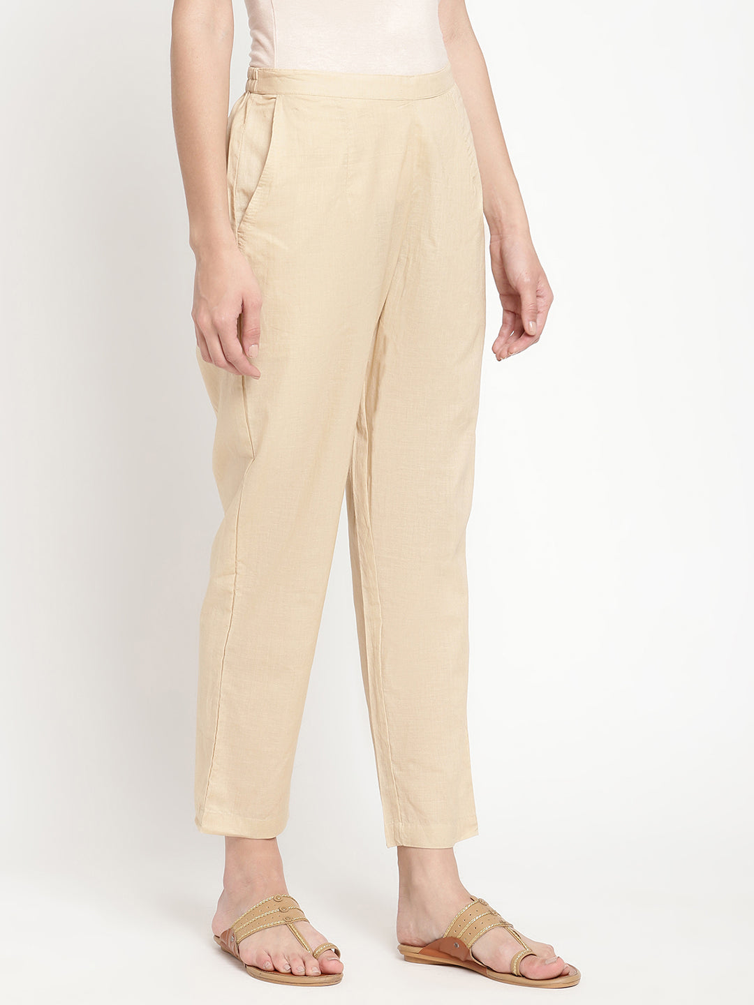 Beige cotton straight pant crafted by a homegrown brand named Savi. 