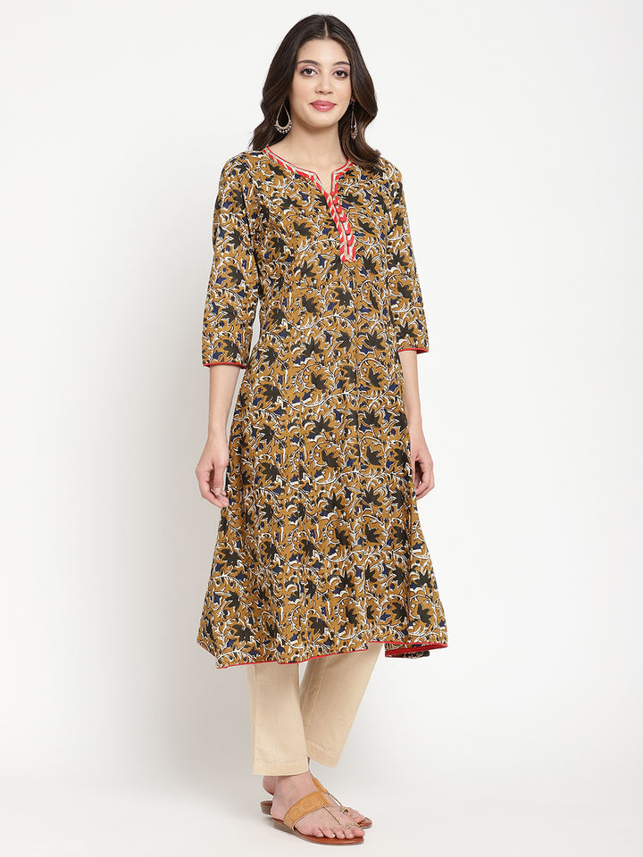 Savi model posing in Beige and Black Cotton Bagru Printed A Line Kurta 