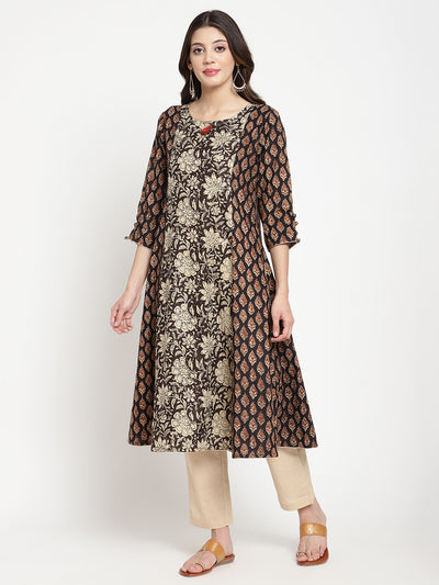 Woman posing in Beige and Black Cotton Printed A Line Kurta Dress 