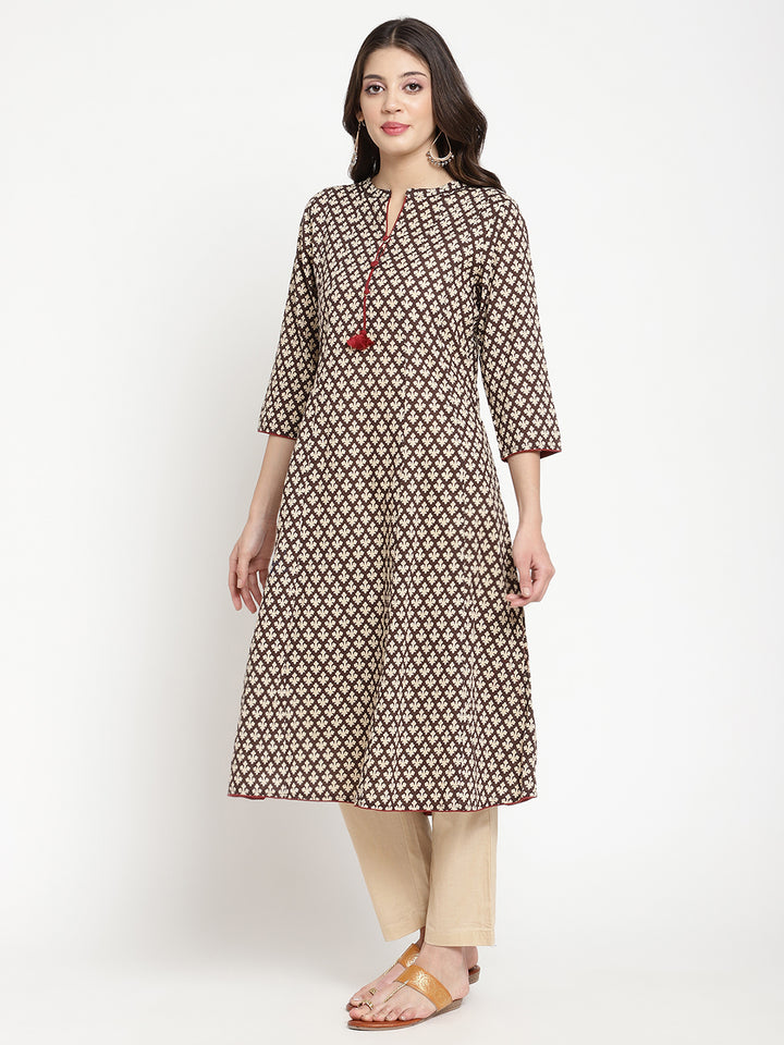 Multicolor Cotton Printed Flared Kurta showcased in a full length picture by Savi model.