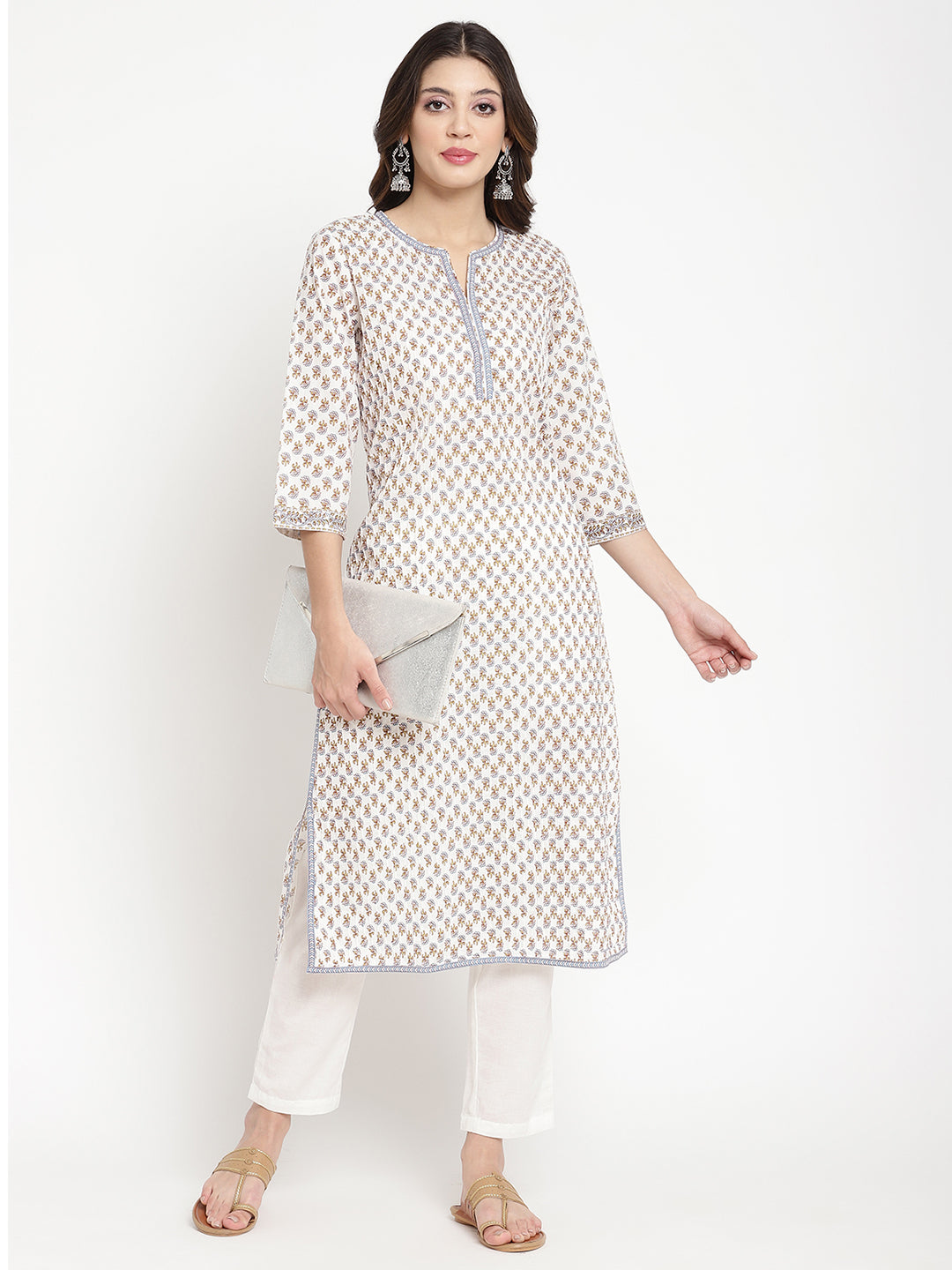 Full shot of a woman wearing Savi’s Blue And White Cotton Printed Straight Kurta. 