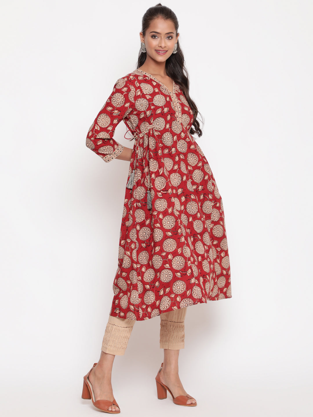 Woman posing in Savi's Cotton Hand Block Printed rust Kurta