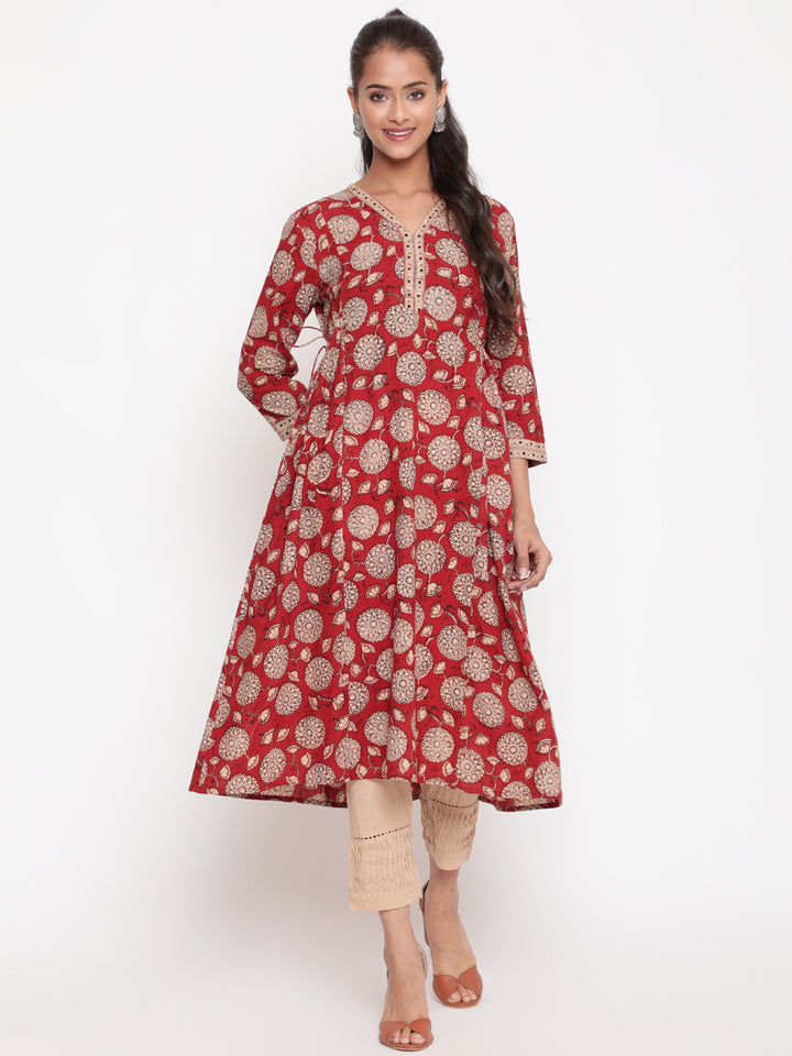 Woman posing in Savi's Cotton Hand Block Printed rust Kurta