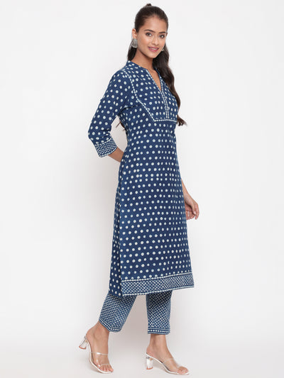 Woman posing in Savi's Cotton Indigo Printed casual Kurta Pant Set