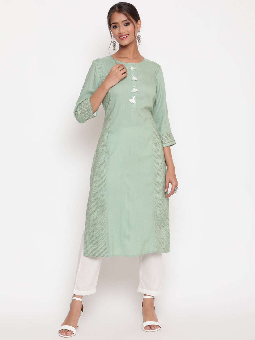 Savi Model posing in Embroidered Sage Green Straight Fit Kurta