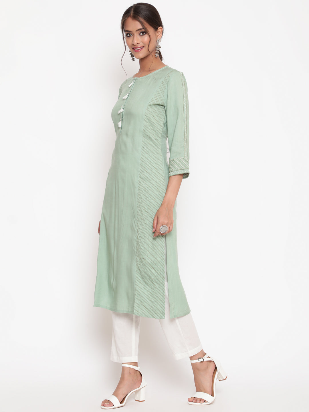 Savi Model posing in Embroidered Sage Green Straight Fit Kurta