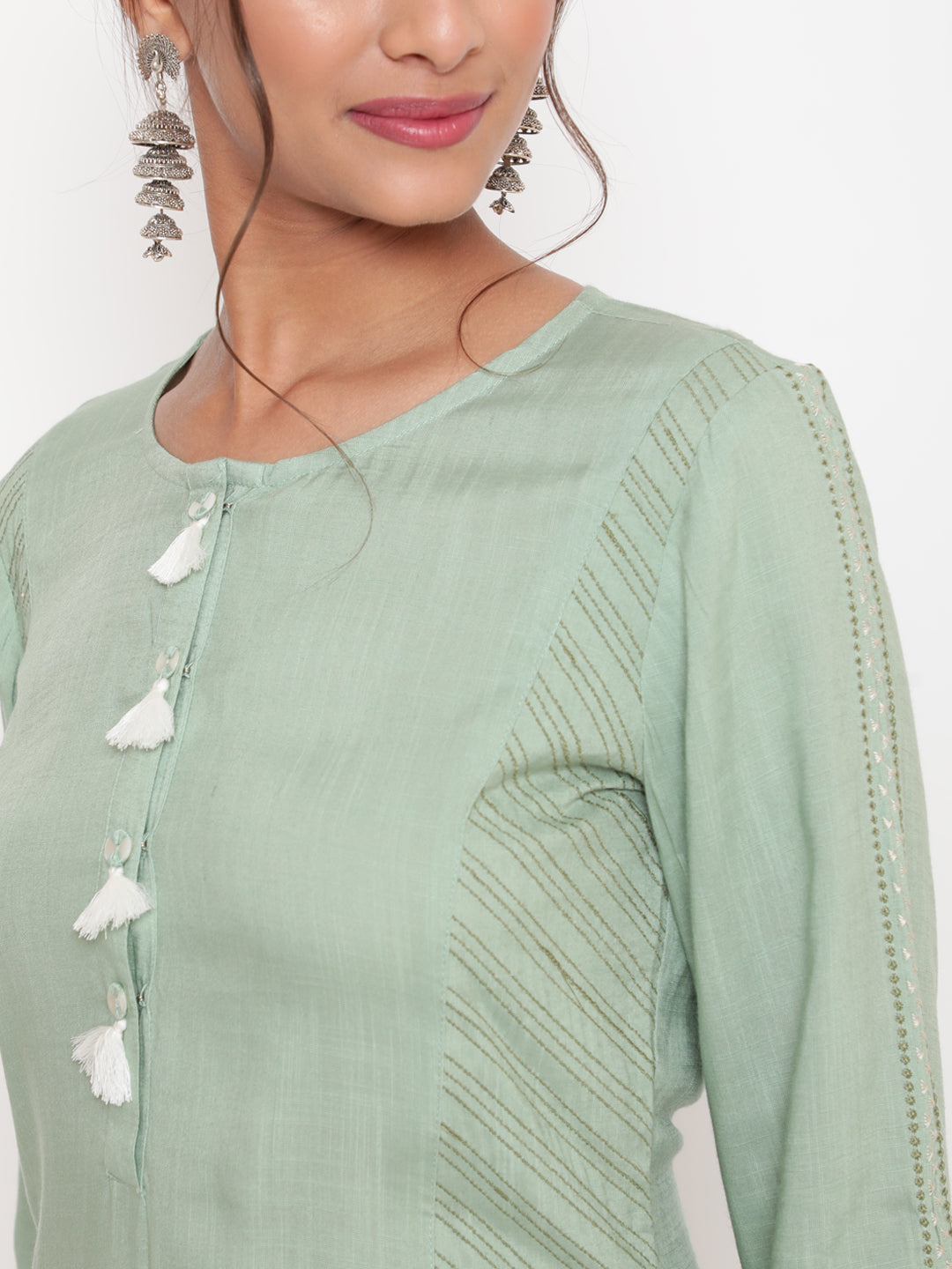 Savi Model posing in Embroidered Sage Green Straight Fit Kurta