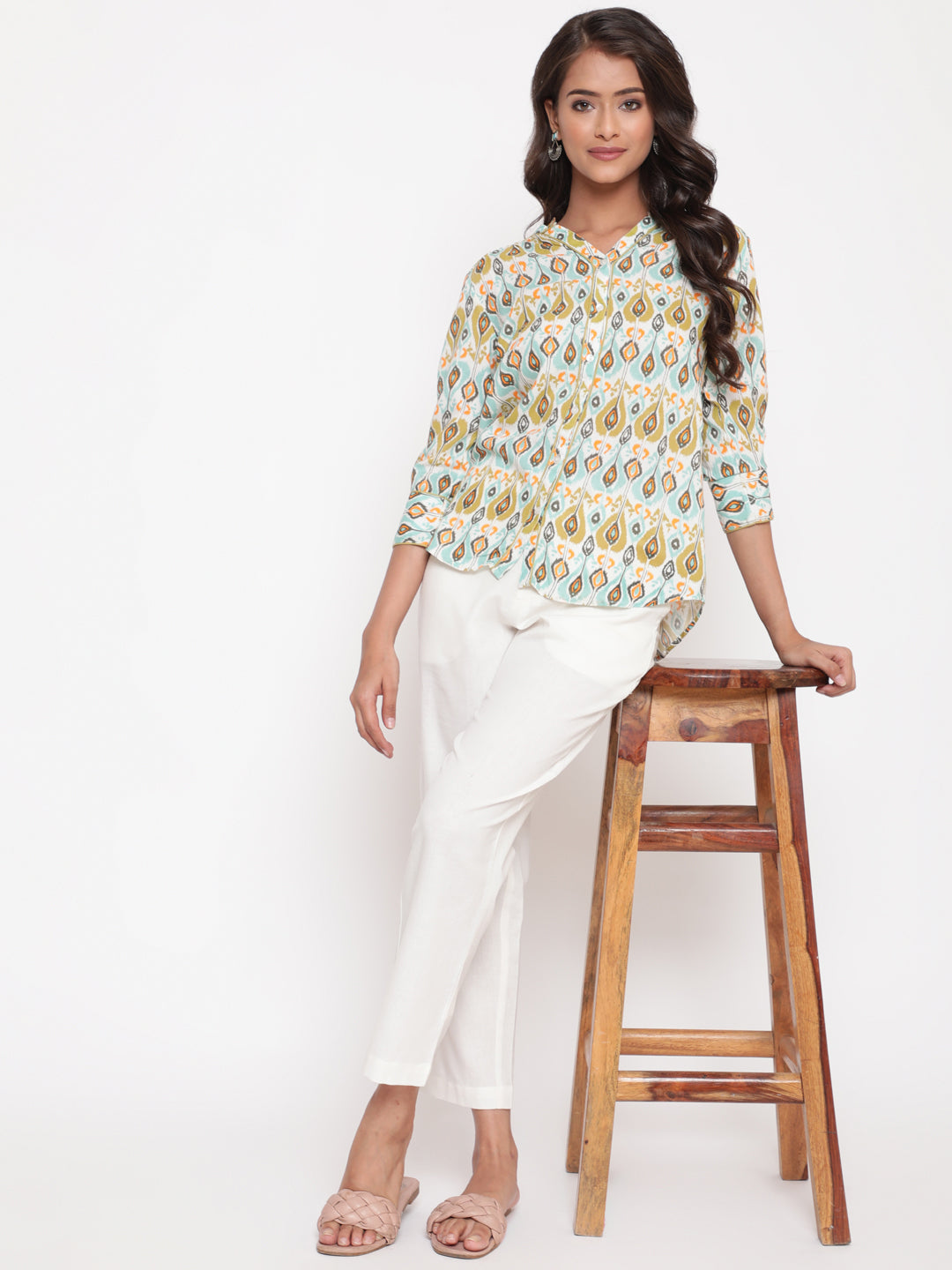 Woman posing in Savi's IKat  Multicolor rayon designer Shirt Top