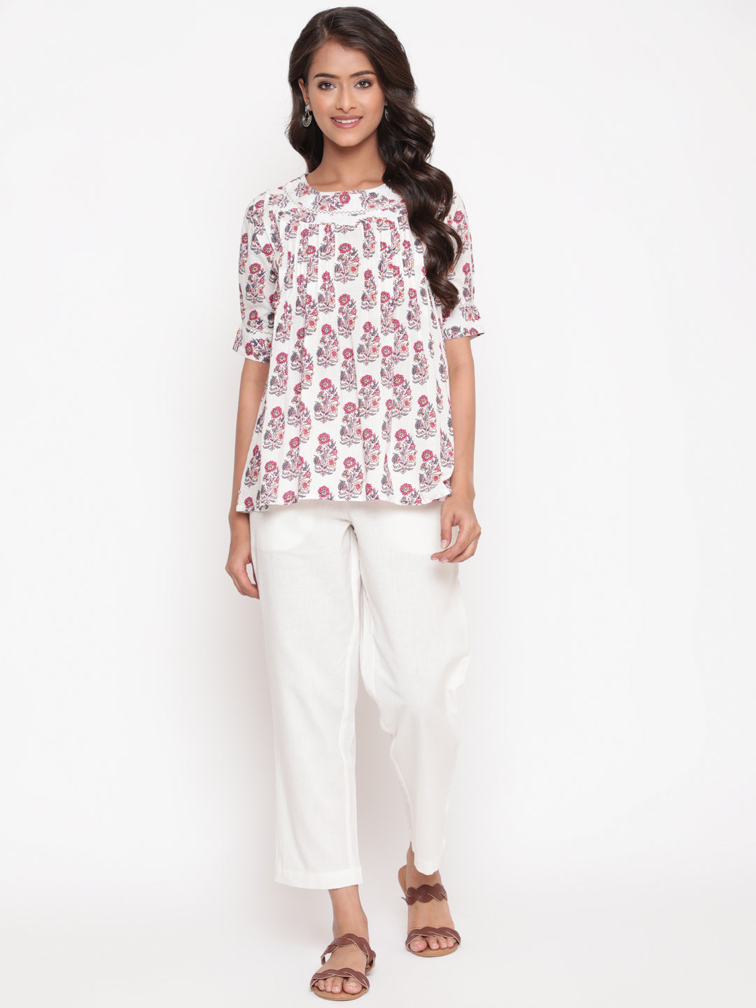 Woman posing in Savi's Cotton Printed White Pintuck Tunic