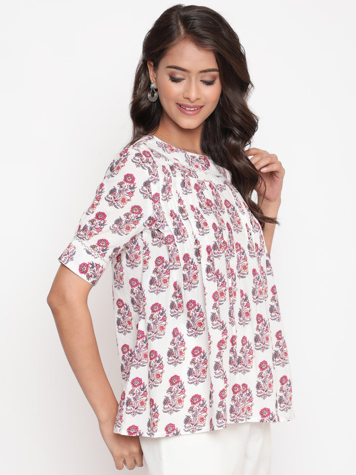 Woman posing in Savi's Cotton Printed White Pintuck Tunic