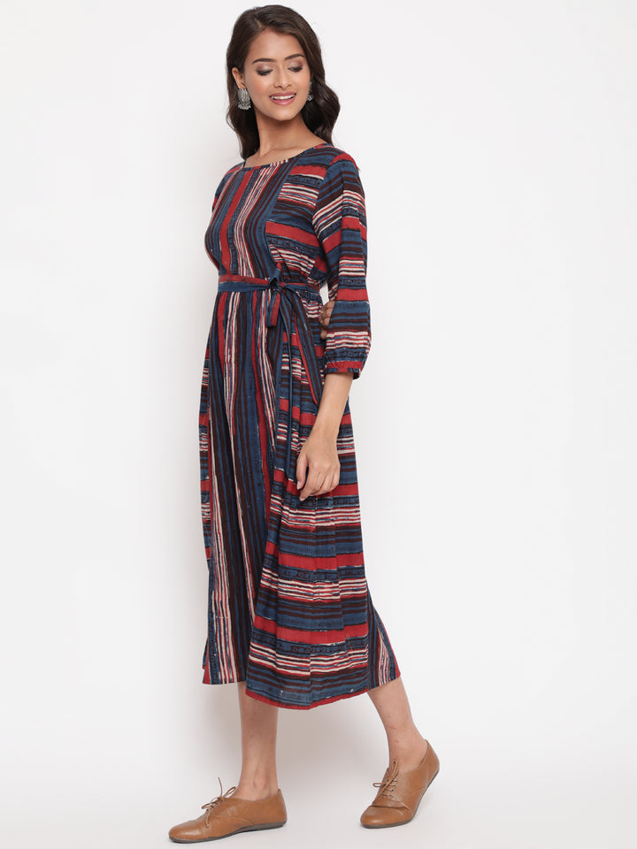 Woman posing in Savi's Bagru Printed Striped Tie up Designer Dress