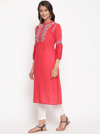 Woman posing in Red Embroidered Designer A Line Kurta