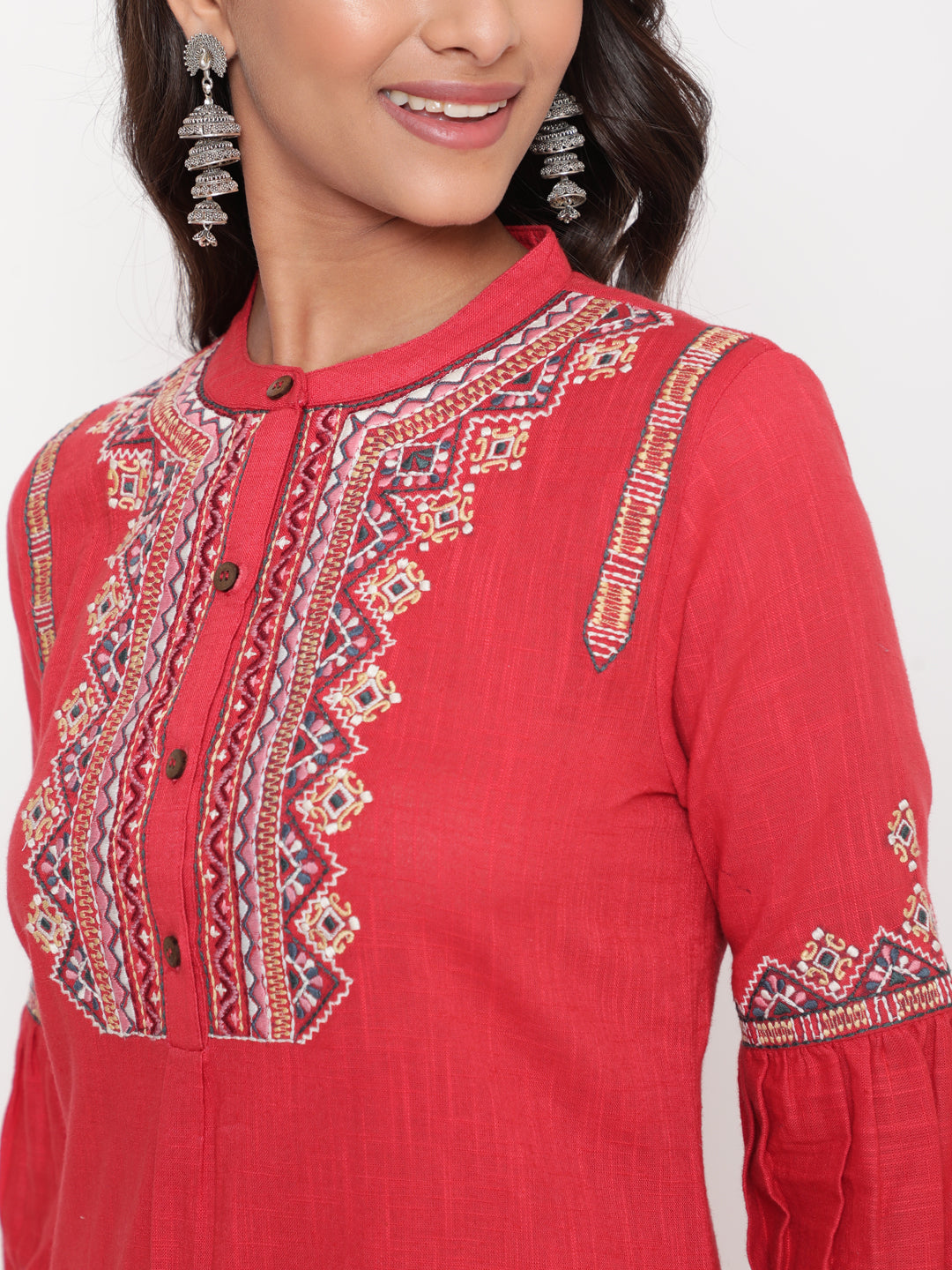 Woman posing in Red Embroidered Designer A Line Kurta