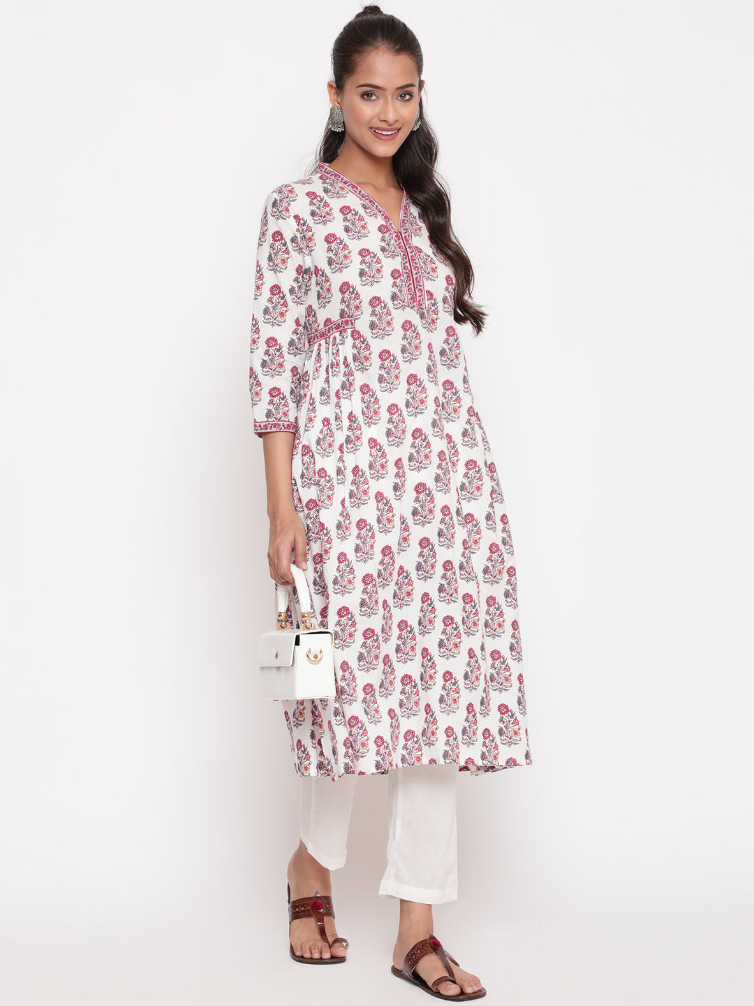 Woman posing in Savi's Paisely Cotton Printed White A Line Kurta With Printed Pant