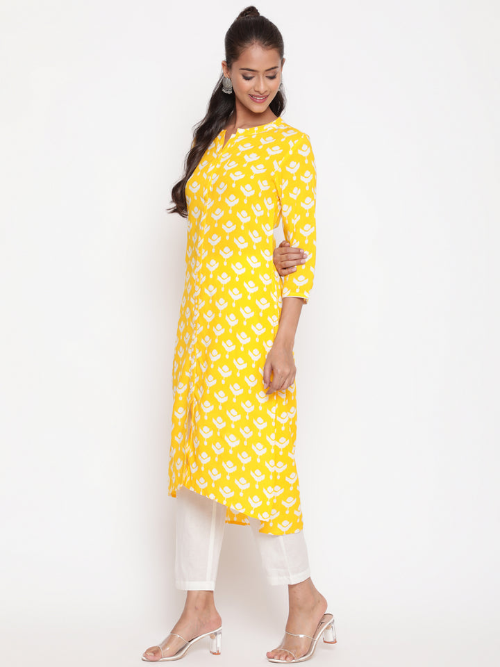 Savi model posing in Yellow Printed Mandarin Collar High Low Kurta