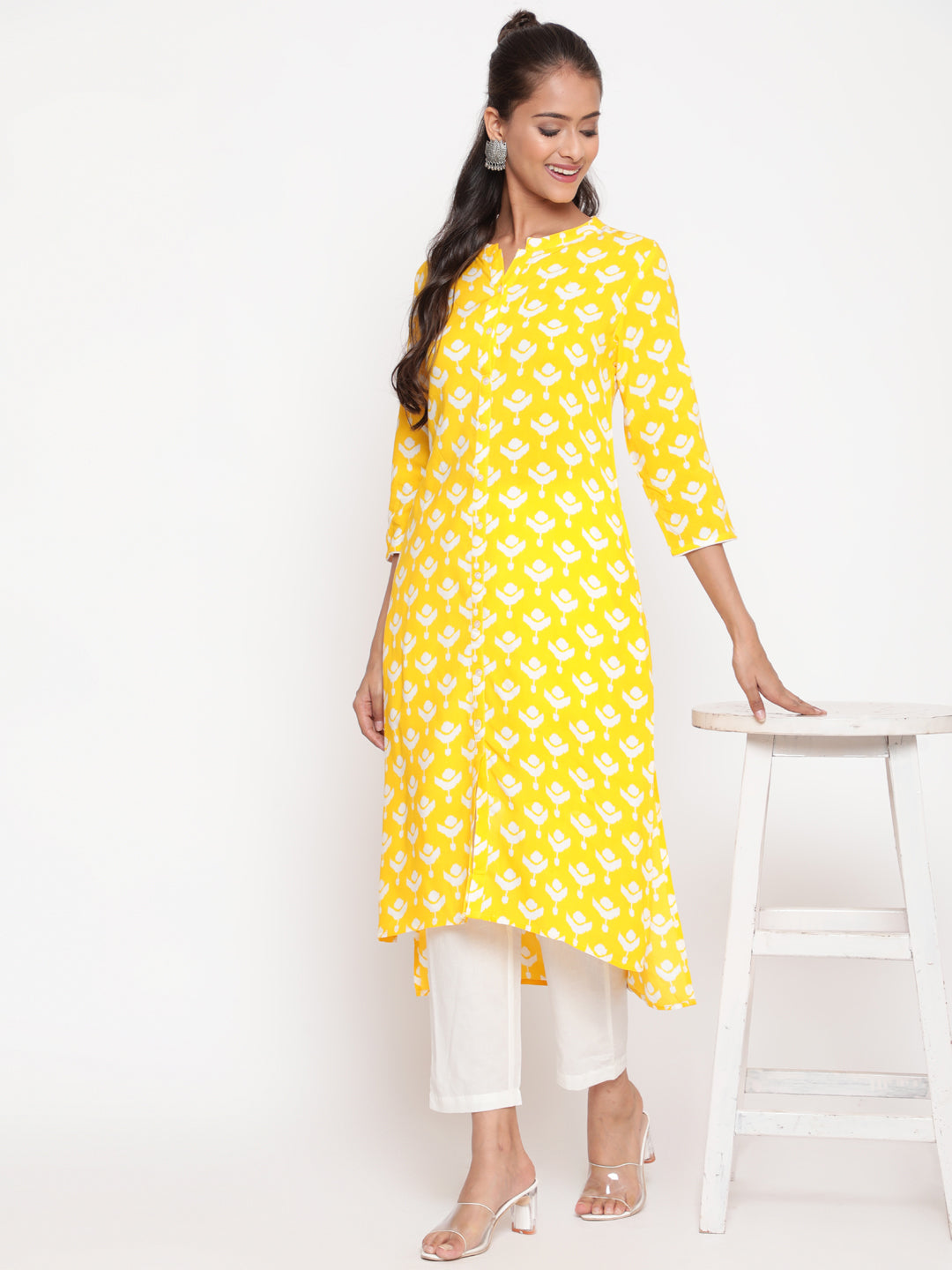 Savi model posing in Yellow Printed Mandarin Collar High Low Kurta