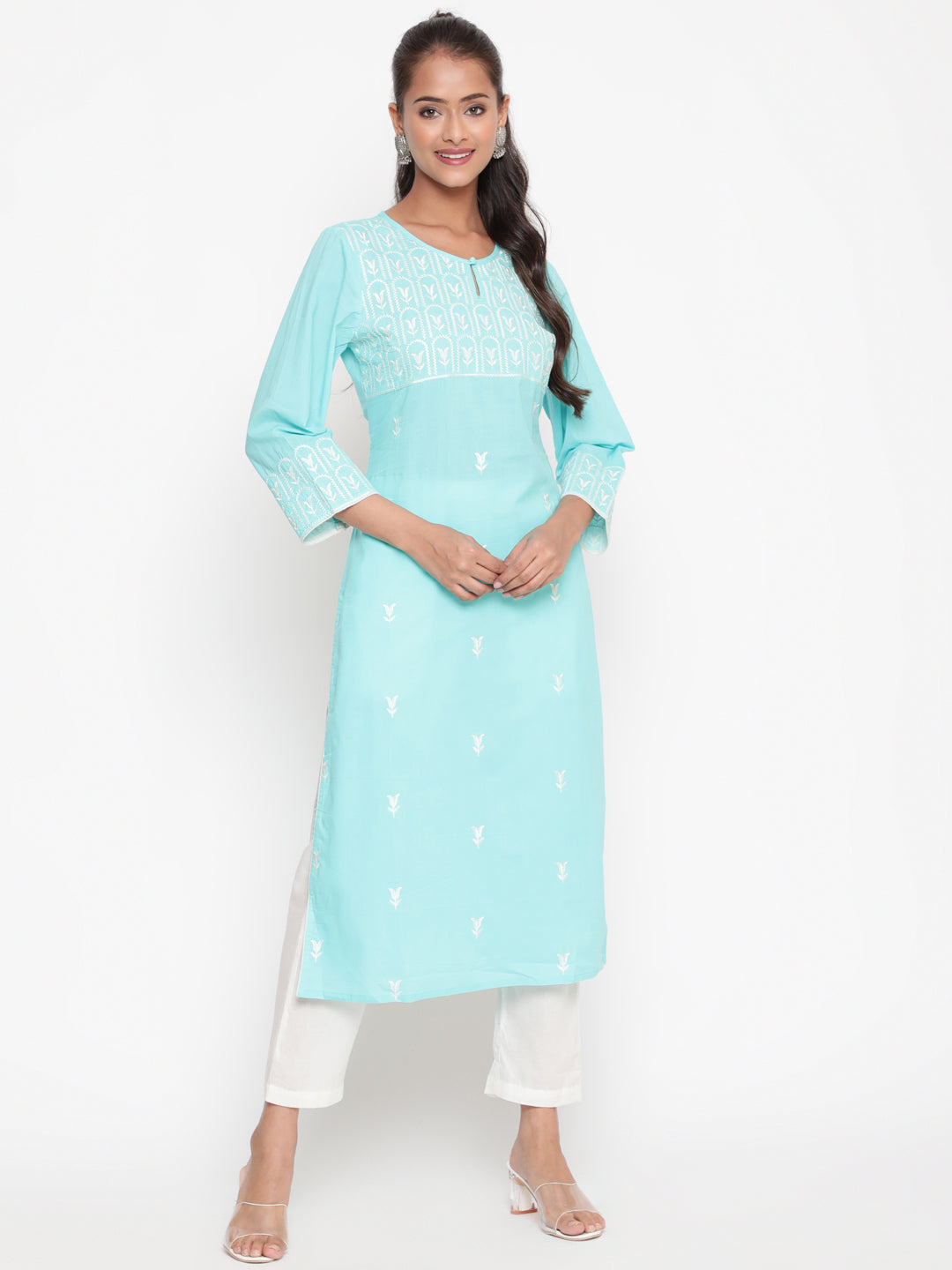 Woman posing in Embroidered Sky Blue Cotton Straight Fit Kurta by Savi