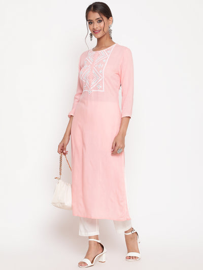 Woman posing in Pink Embroidered Casual A Line Kurta