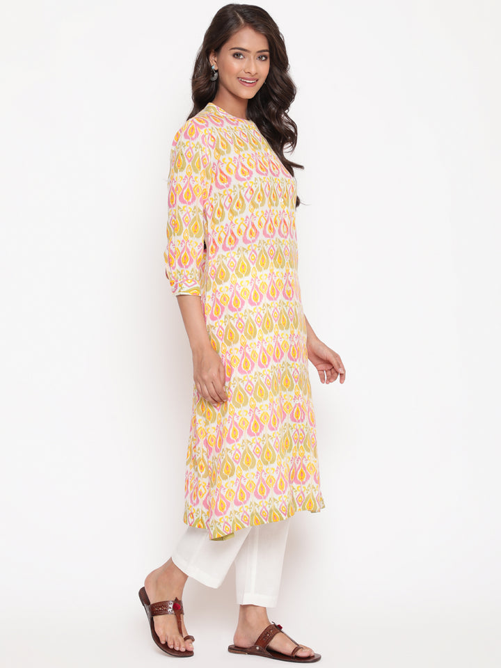 Woman posing in Peach Pink Rayon Ikat Printed Mandarin Collar Kurta