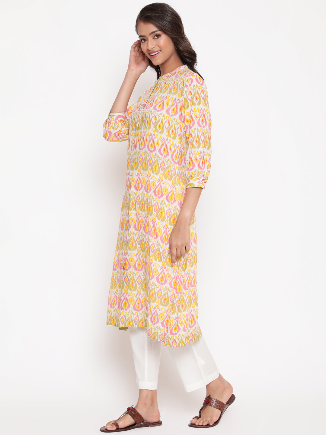 Woman posing in Peach Pink Rayon Ikat Printed Mandarin Collar Kurta