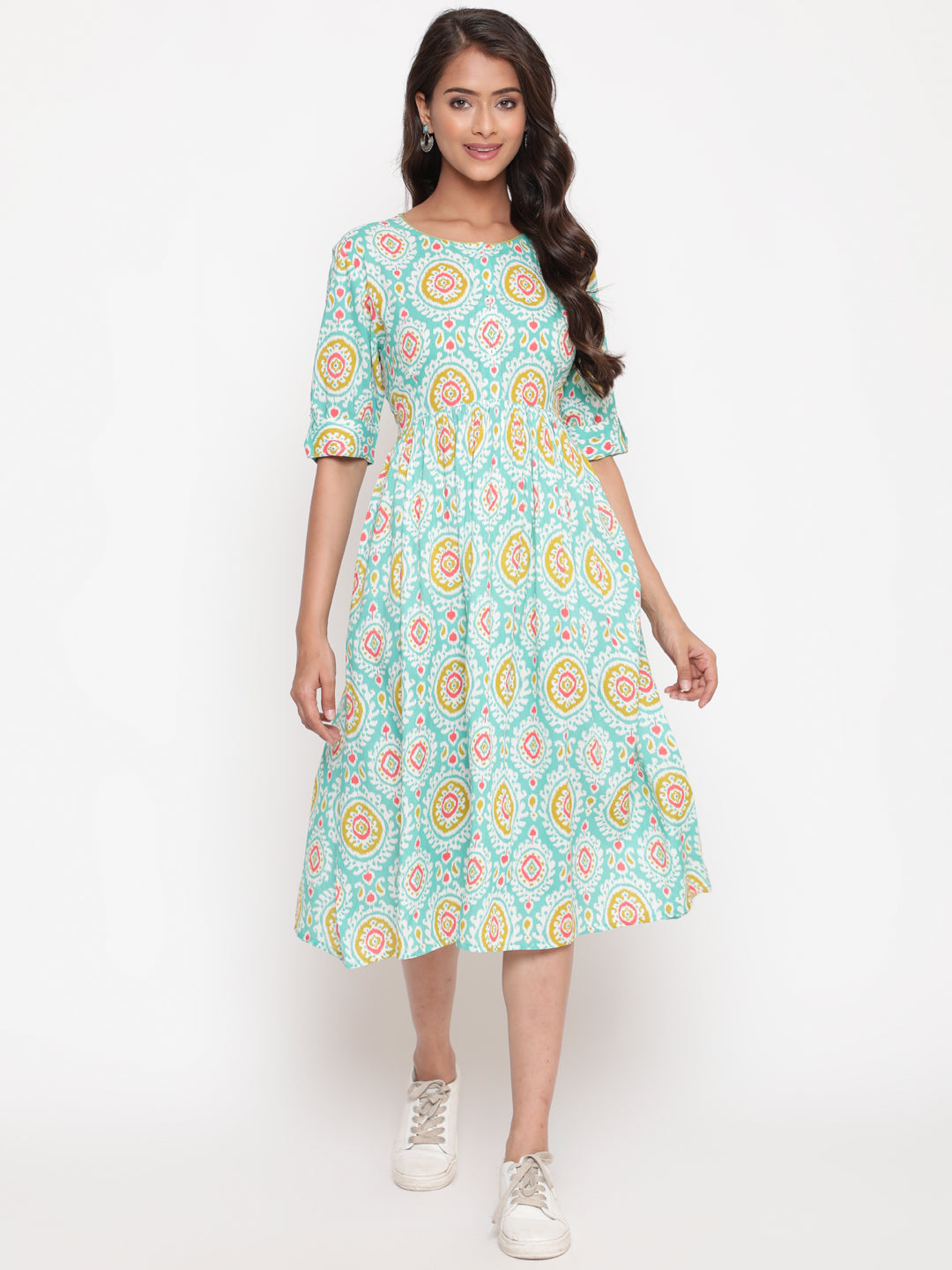 Woman posing in Mint Ikat Printed Knee Length Designer Dress
