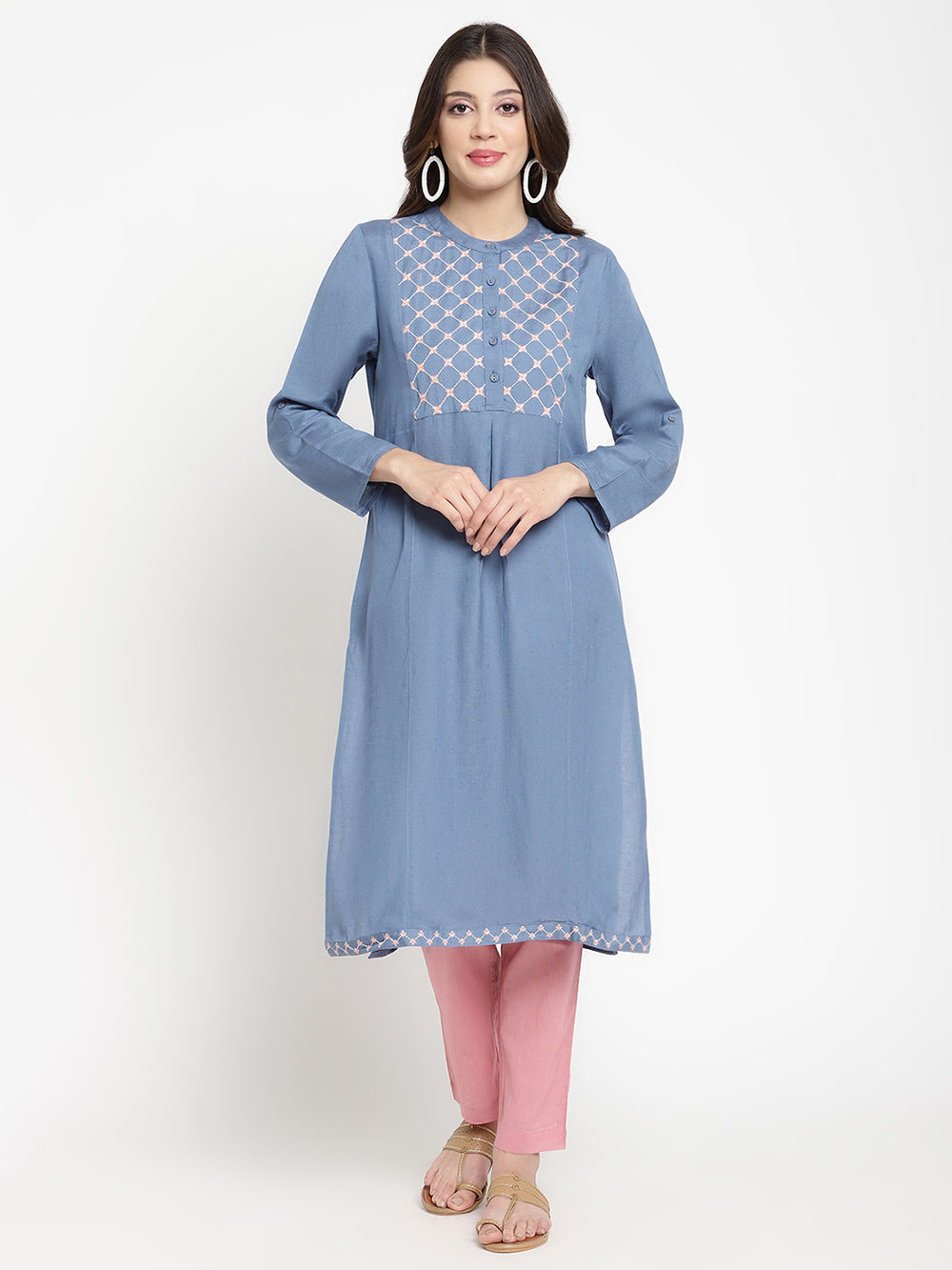 Woman wearing rayon blue Kurta by Savi. 