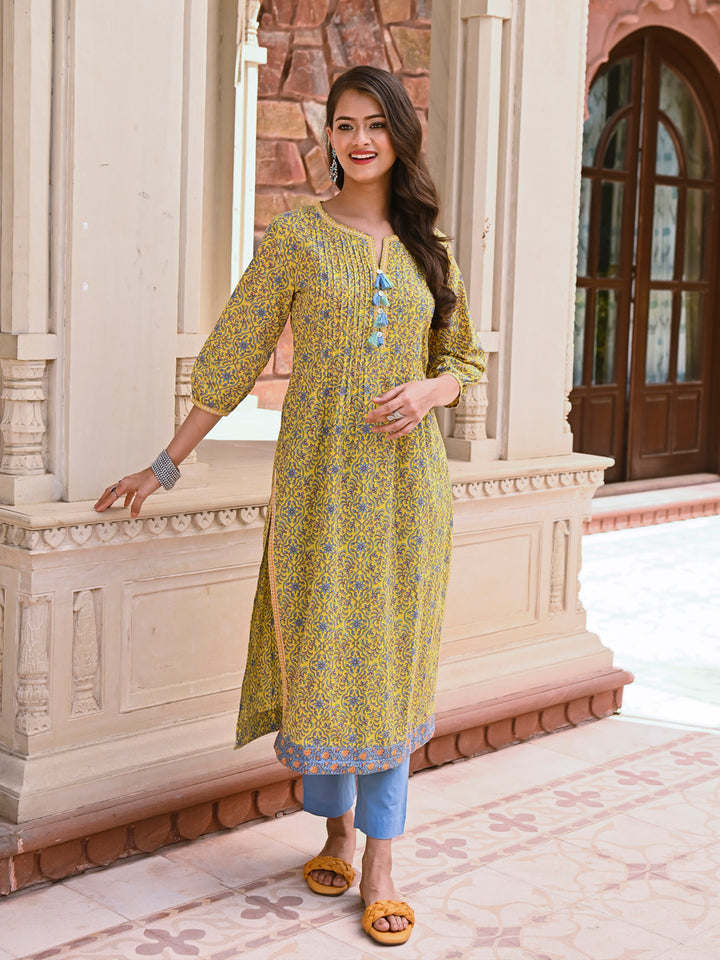 Woman posing in Yellow Block Printed Pintuck Stylish Straight Kurta