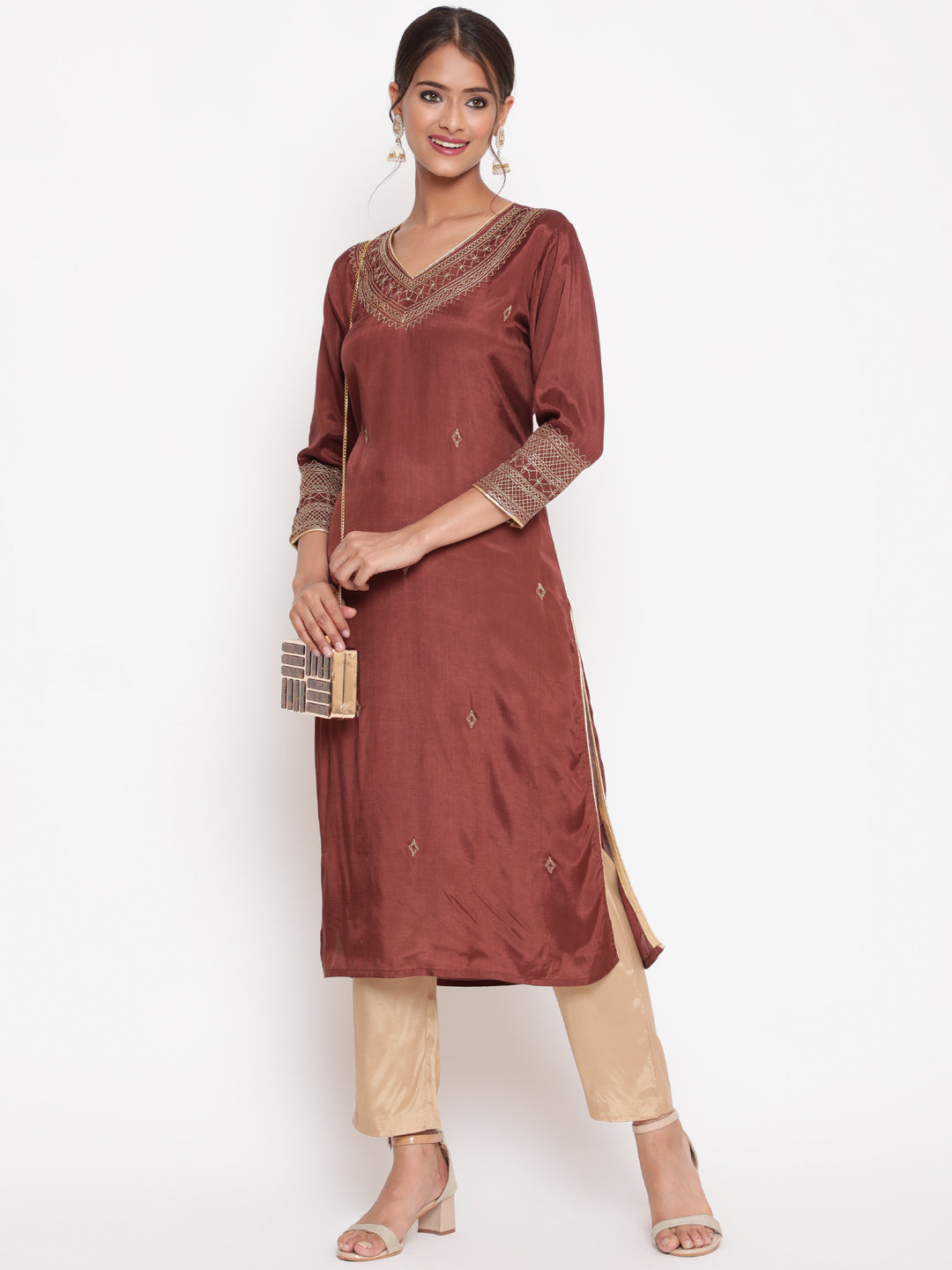 Woman posing in Brown Embroidered Straight Kurta Pant Set