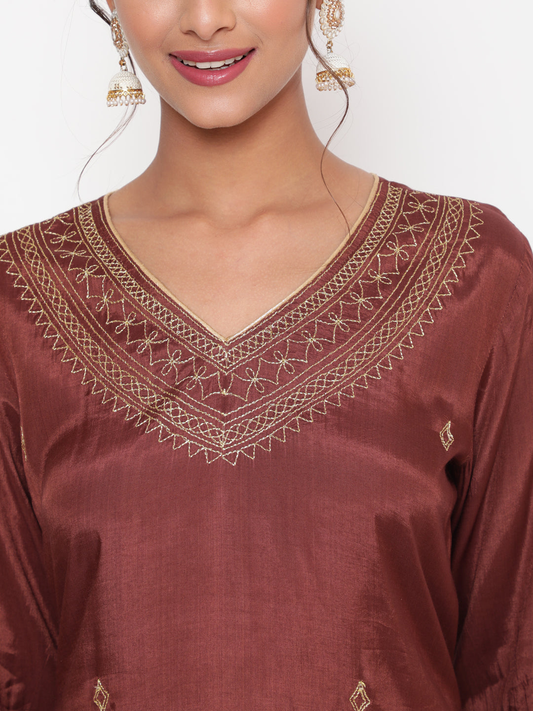 Woman posing in Brown Embroidered Straight Kurta Pant Set