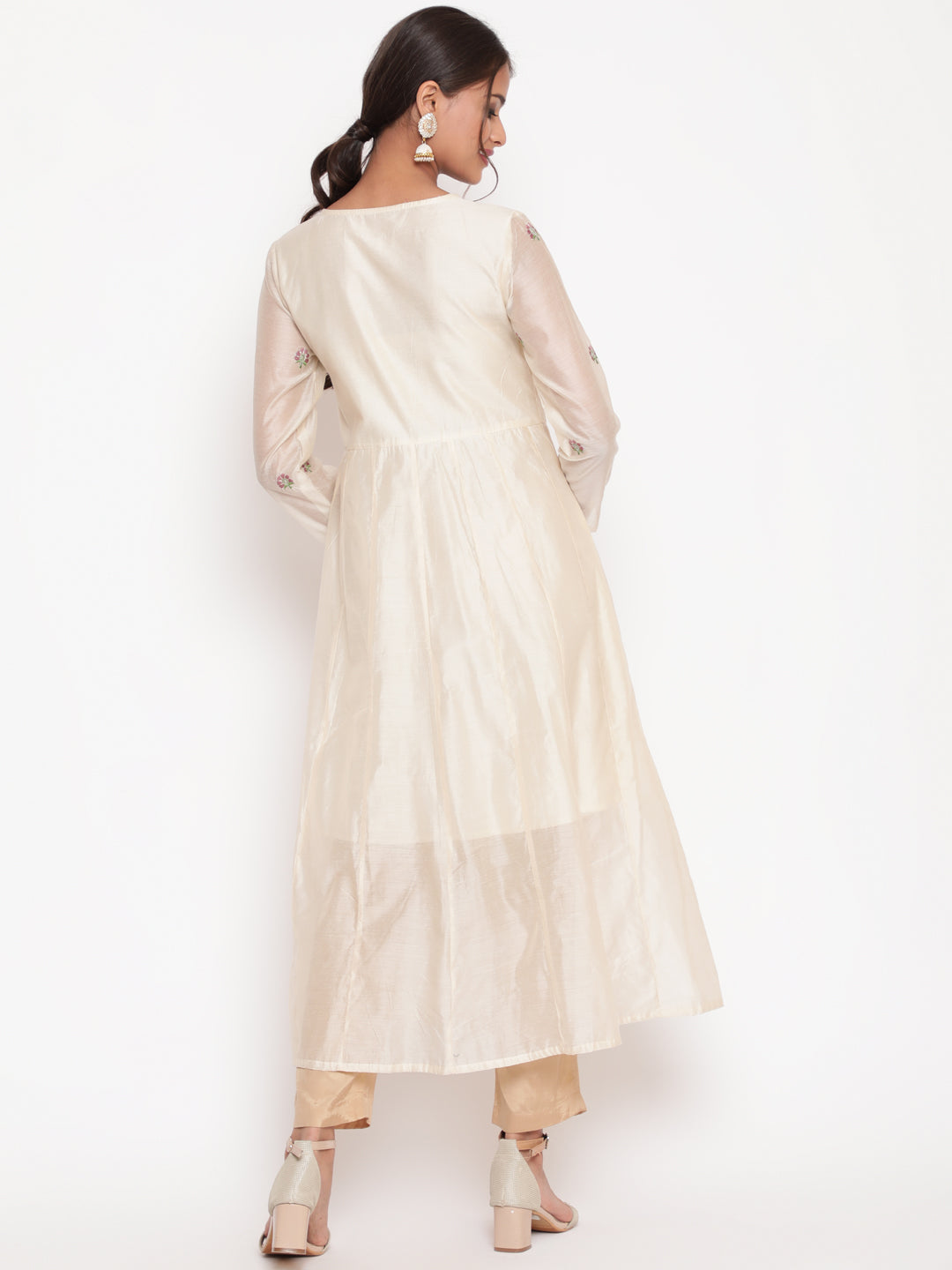 Woman posing in Savi's Silk Chanderi Ethnic Motif Embroidered Off White Angrakha Kurta