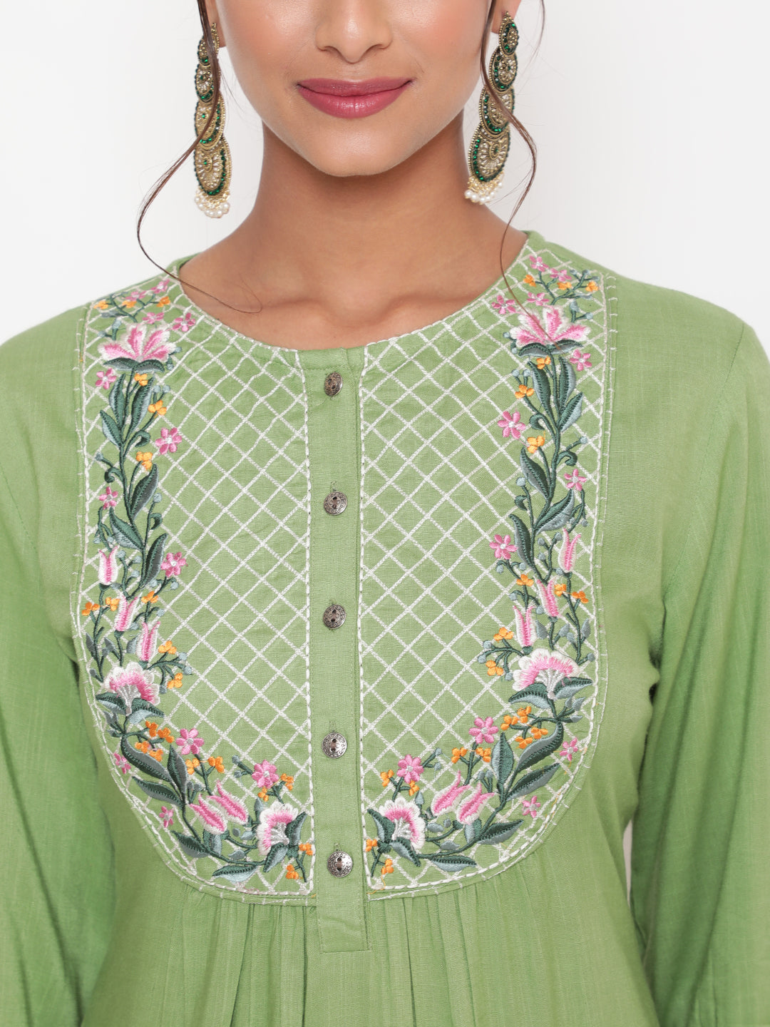 Woman posing in Savi's Green Embroidered Kurta Pant set With Contrast Detailed Dupatta